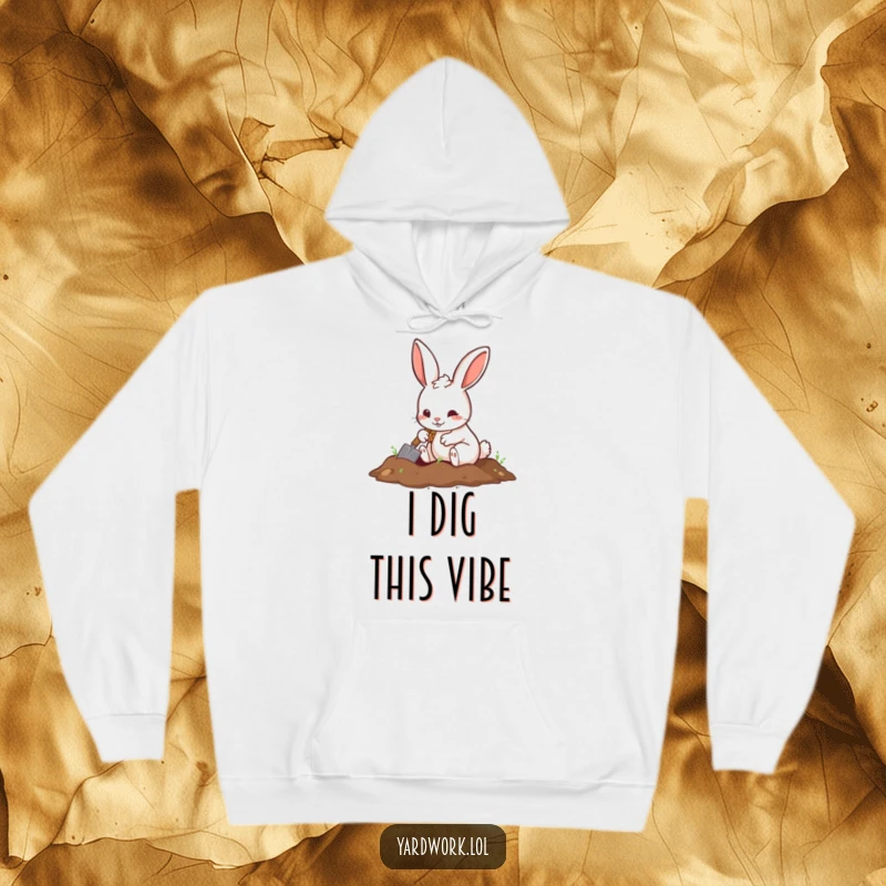 Funny hoodie with a playful rabbit digging a hole with a small shovel, perfect for cozy adventures.