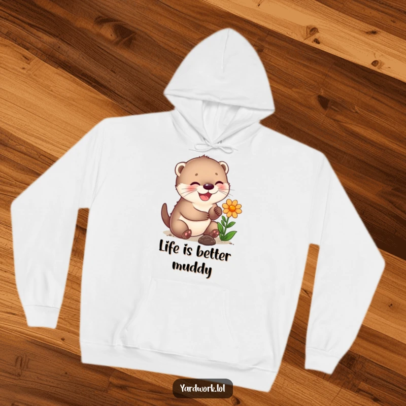 Funny hoodie with a joyful otter cub planting a flower, perfect for cozy gardening vibes.
