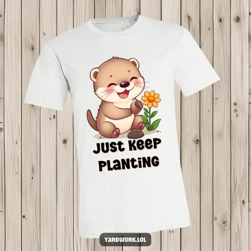 Funny t-shirt featuring a joyful otter cub happily planting a vibrant flower, celebrating nature's beauty.